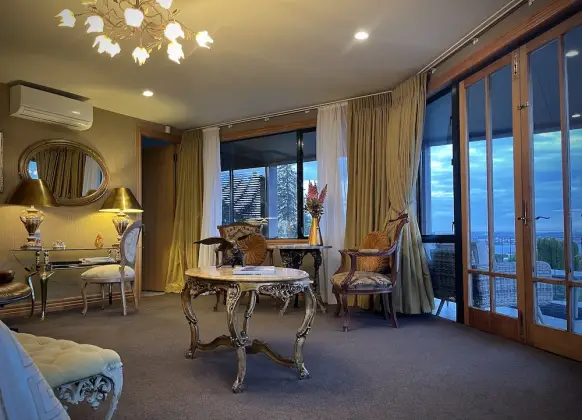 The Flying Trout Boutique Lodge Tui Suite Bedroom at Dusk